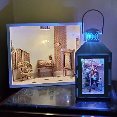 Ramadan lantern containing a scene from an Egyptian street during Ramadan