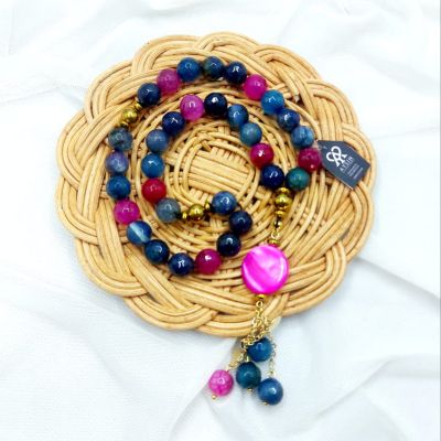 A 33-bead rosary made of agate stones, hematite spacers, and Chinese gold-plated chains.