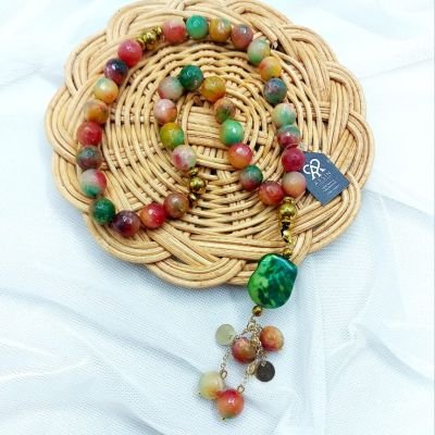 A 33-bead rosary made of agate stones, hematite spacers, and Chinese gold-plated chains.