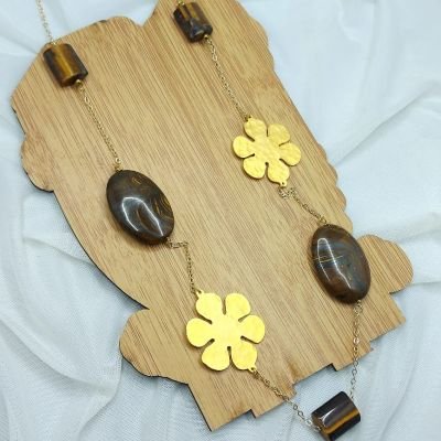 A necklace made of a tiger stones and gold-plated copper.