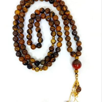 A 99-bead prayer necklace made from tiger eye stones.