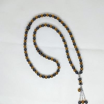 A 99-bead prayer necklace made from hematite stones.