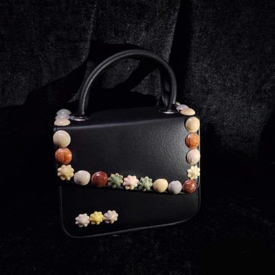 Black Leather bag inlaid with colored ceramics