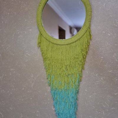 Wall mirror made by loom 