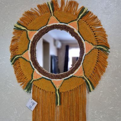 Wall mirror made by loom 