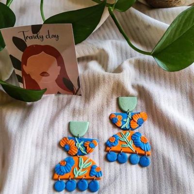 floral earrings 🧡💙