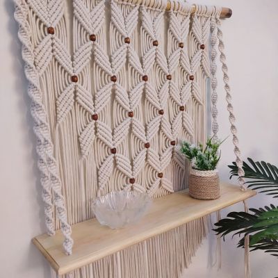 Macrame wall hanging with shelf 