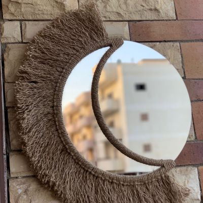 Boho crescent shaped mirrors