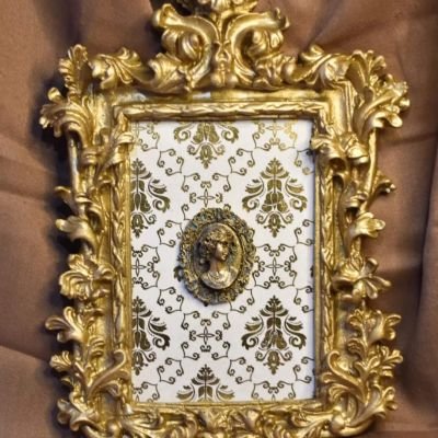 Antique gold plated tableau