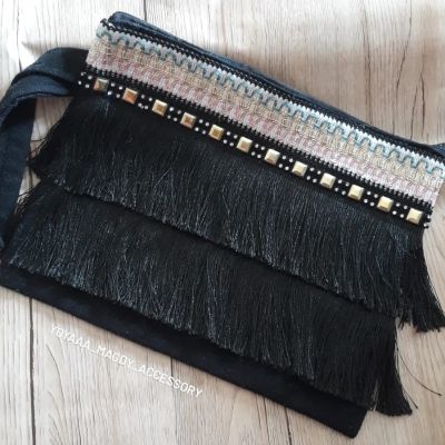 Black clutch with tassel straps