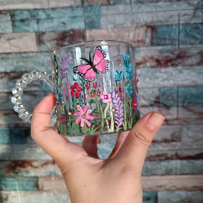 Glass mug with flowers 