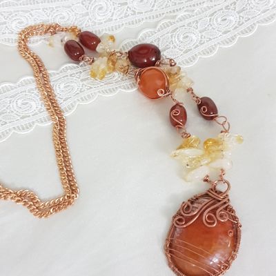 Citrine and agate🧡🧡 wrapped with red copper in a necklace