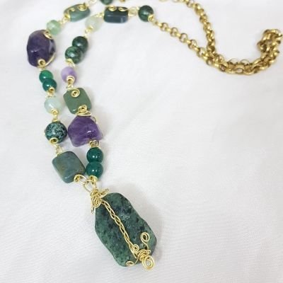 A unique handmade necklace 💚💜with copper and gemstones including amathyst and African turquoise 