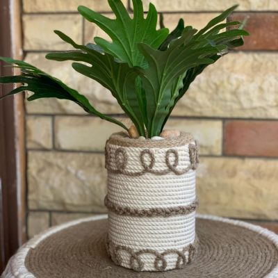 Roll-shaped planting pot