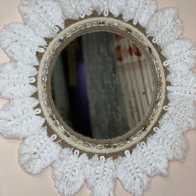 Mirrors with macrame feathers