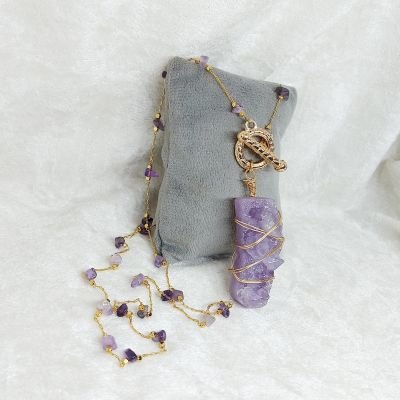 The necklace is made of amethyst stones.