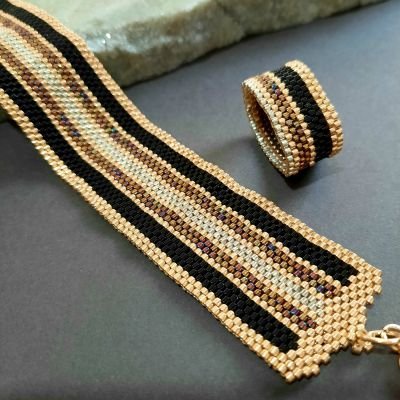 Design with shiny colorful lines with golden by Miyuki beads