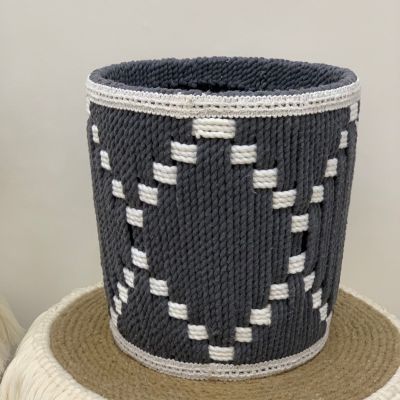 Basket with macrame threads