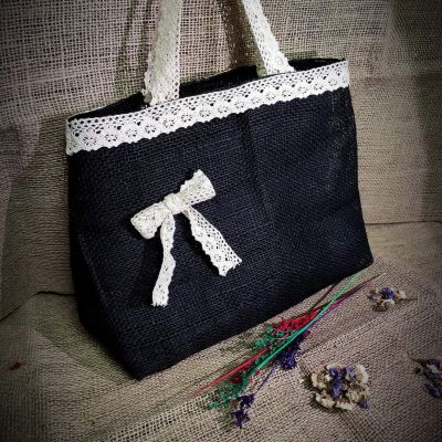 Jute bag decorated with cotton lace 