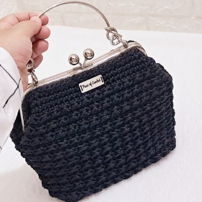 Crochet evening bag with metal frame