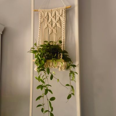 Macramé wall hanging with shelf 