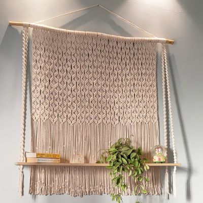 Macramé wall hanging with shelf 