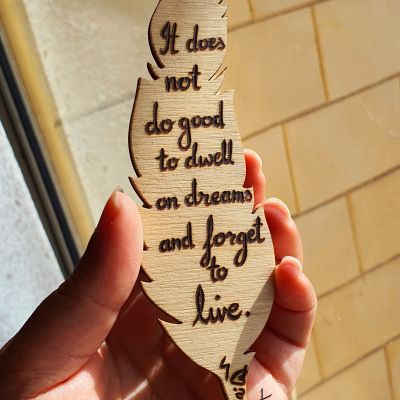 It does not do good to dwell on dreams - Feather Bookmark