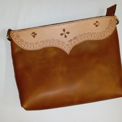 Genuine leather bag, hand engraved and hammered